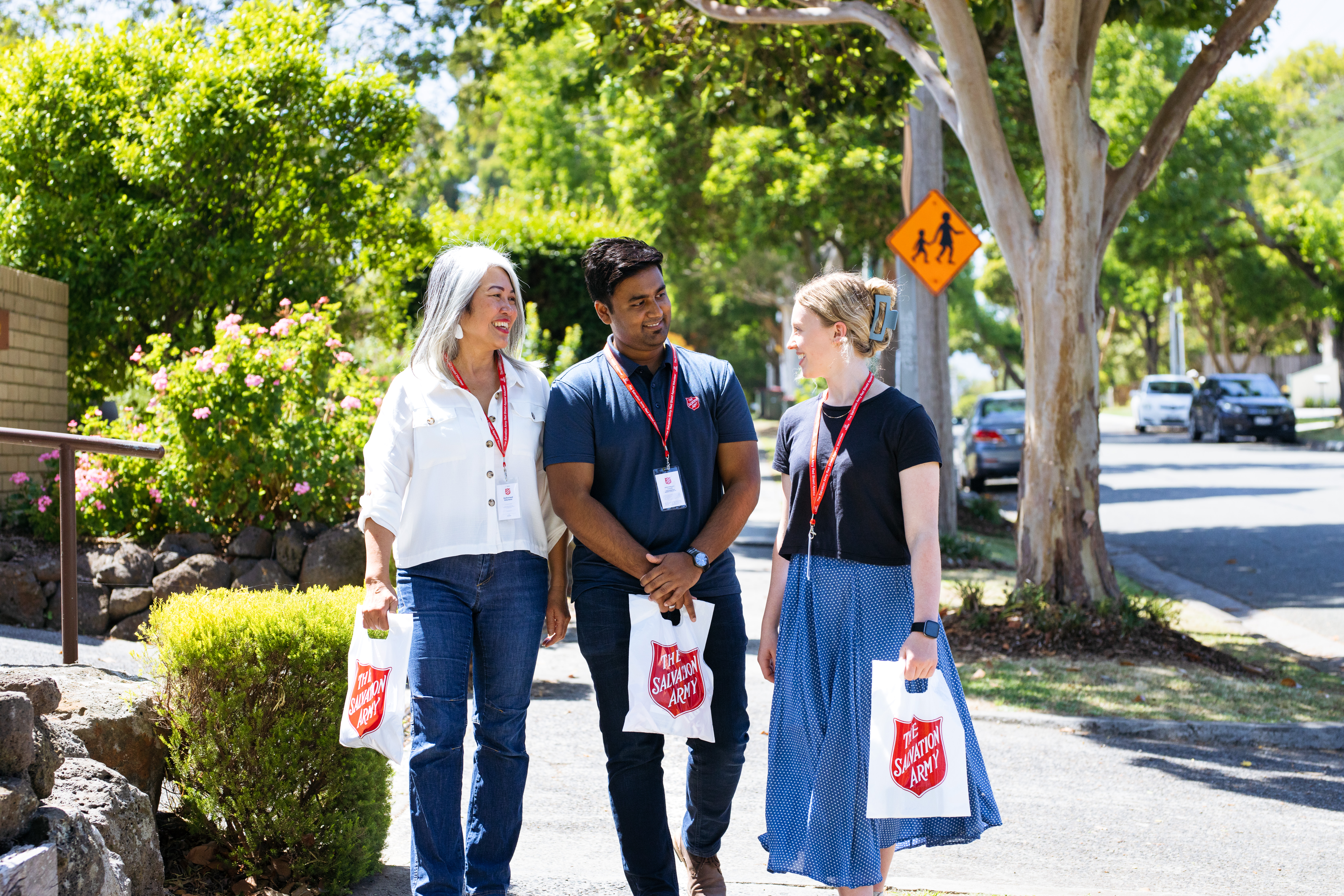 People walking talking as they raise funds